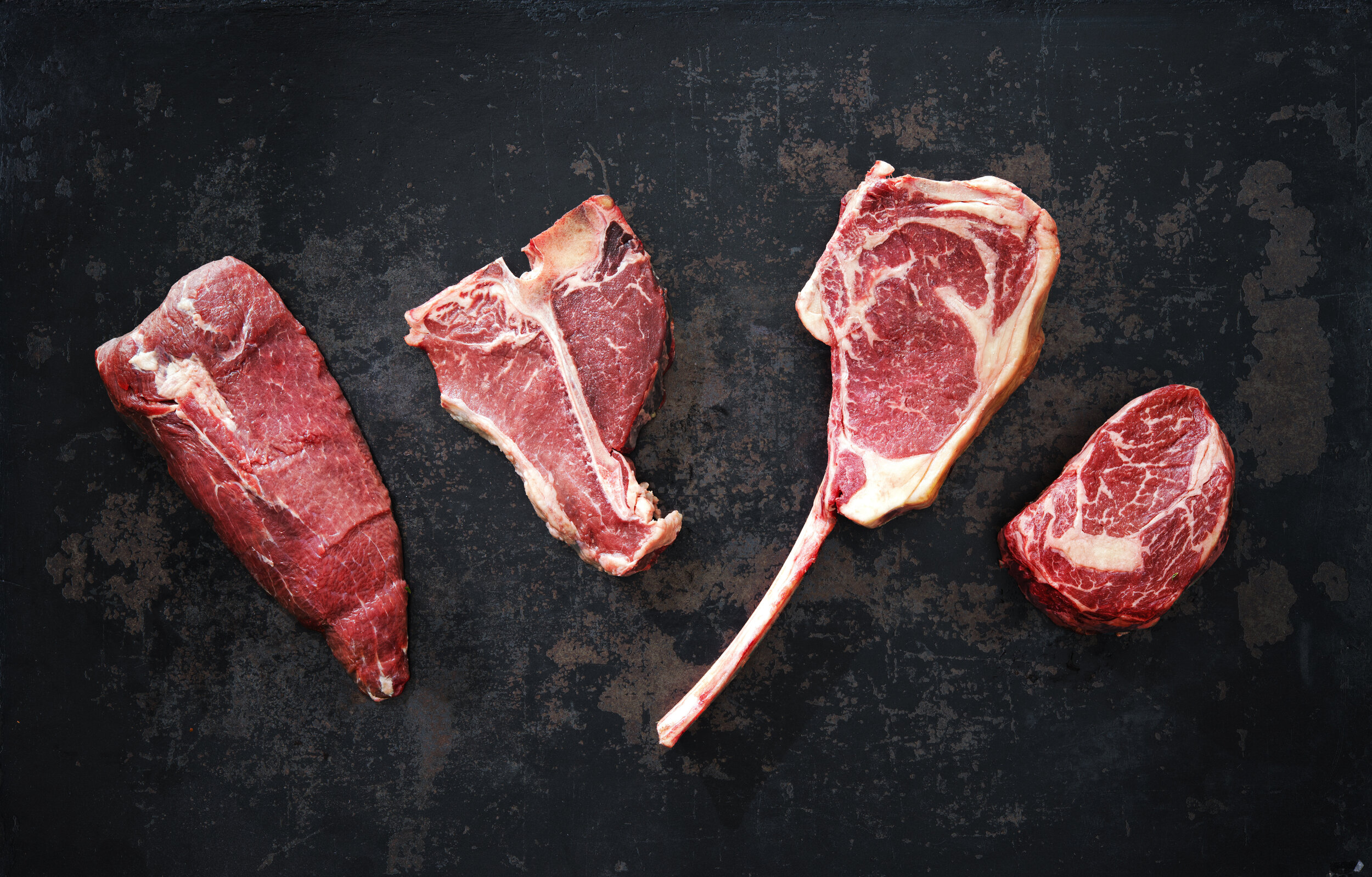 Variety of raw beef meat for grilling